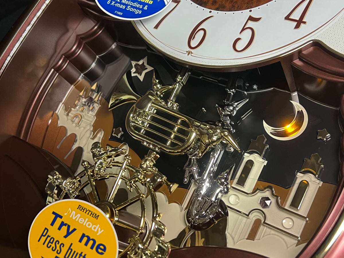 Rhythm “Concerto Entertainer II” Musical Motion Decorative Pendulum Wall Clock - 4MH889WU23