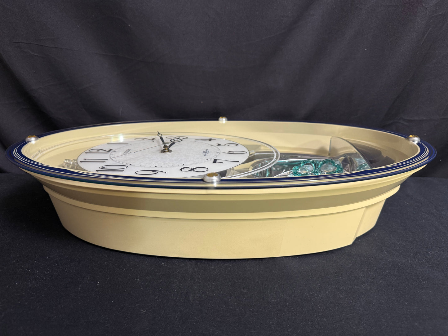 Citizen (Rhythm) "Pal Muse M482" Musical Motion Decorative Pendulum Wall Clock from Japan with LED Light Show - 4MN482-003