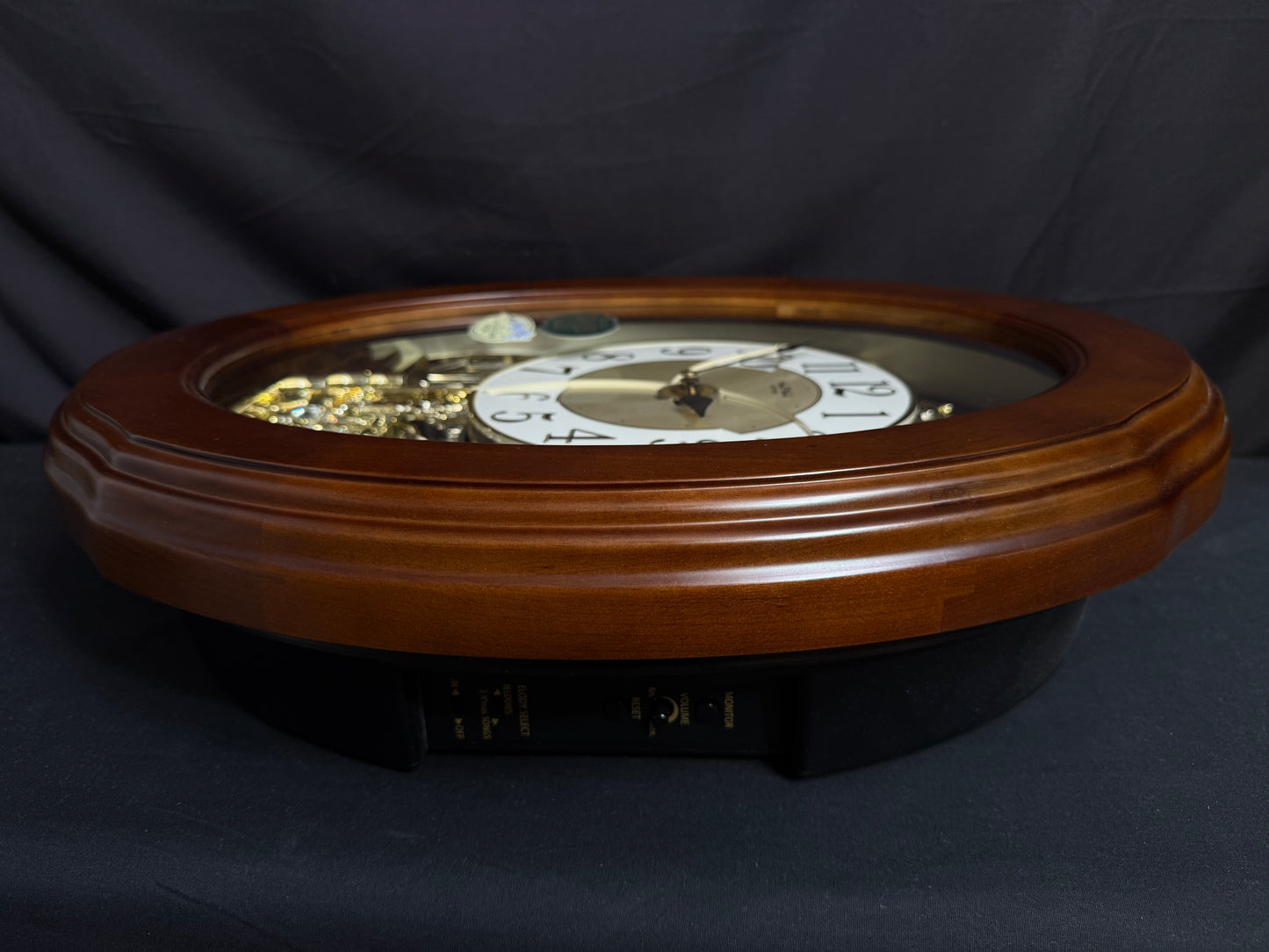 Rhythm "CTS Nostalgia" Moving Dial Magic Motion Musical Wooden Wall Clock with Popular Melodies - 4MH780-R06