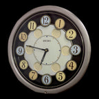 Seiko QXM106SRH "Twirling Numbers" Melodies in Motion Musical Wall Clock with Moving Dial
