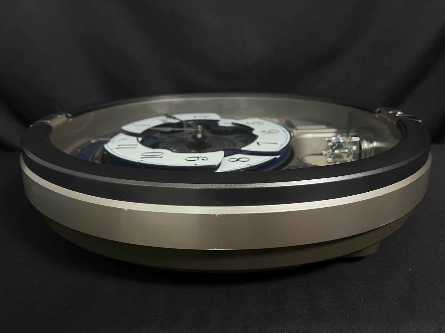 Seiko QXM366SRH “Musical Motifs” Melodies in Motion Dancing Dial Musical Wall Clock
