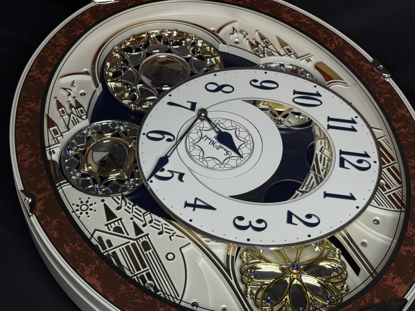 Rhythm "Gala III" Magic Motion Musical Wall Clock with Rotating Dial - 4MH447WU23