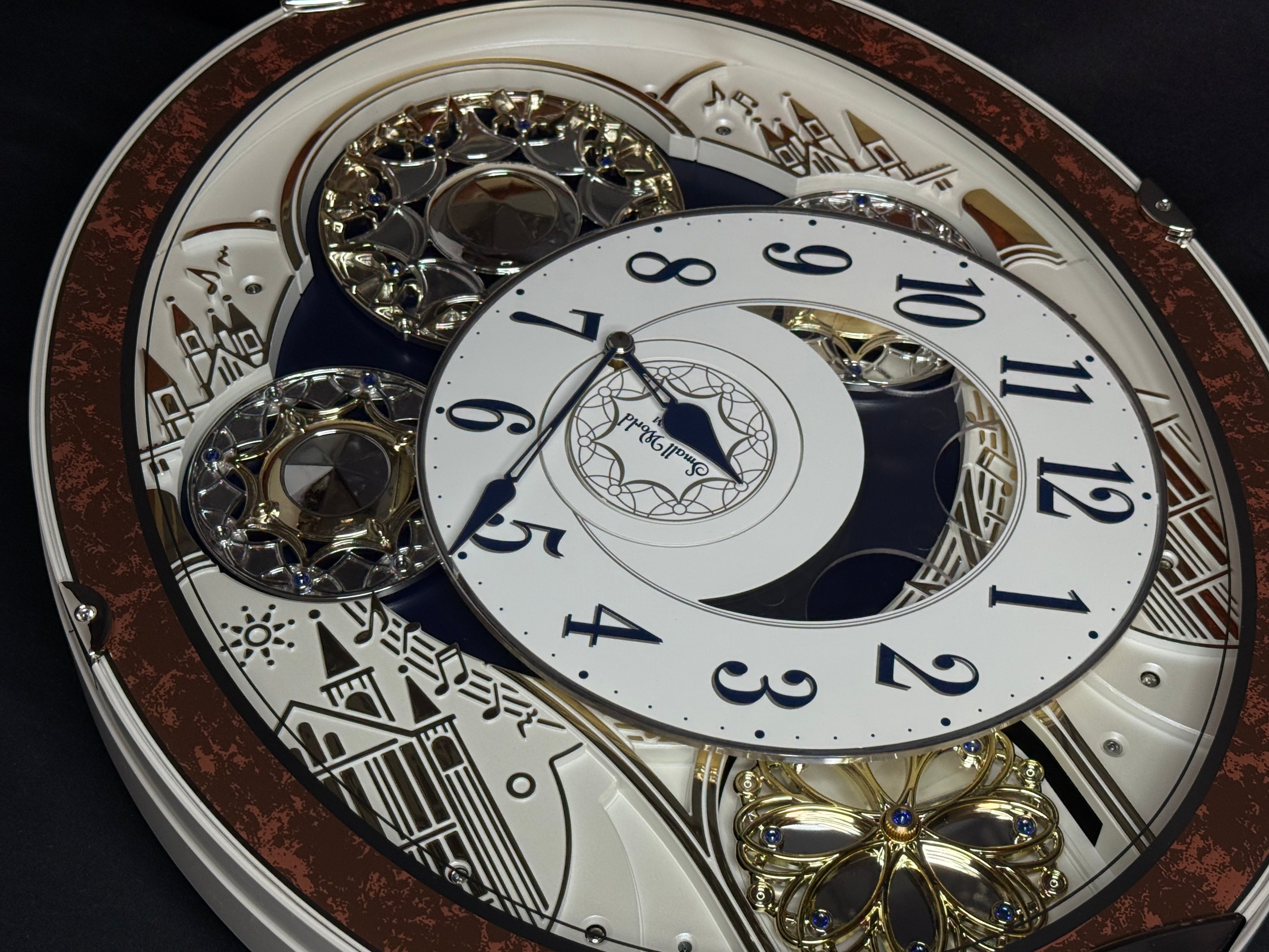 Rhythm "Gala III" Magic Motion Musical Wall Clock with Rotating Dial - 4MH447WU23
