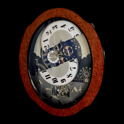 Rhythm “DWS Timecracker” Moving Dial Magic Motion Musical Wooden Wall Clock with Popular Melodies - 4MH752-R06