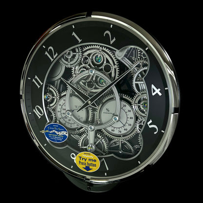 Rhythm “Chronograph (Black/Silver)” Skeletonized Dial Magic Motion Musical Wall Clock with Moving Gears - 4MH442WU08