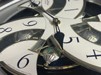 Rhythm “Tri-Cracker” Moving Dial Magic Motion Musical Wall Clock with Popular Melodies - 4MH759NR06