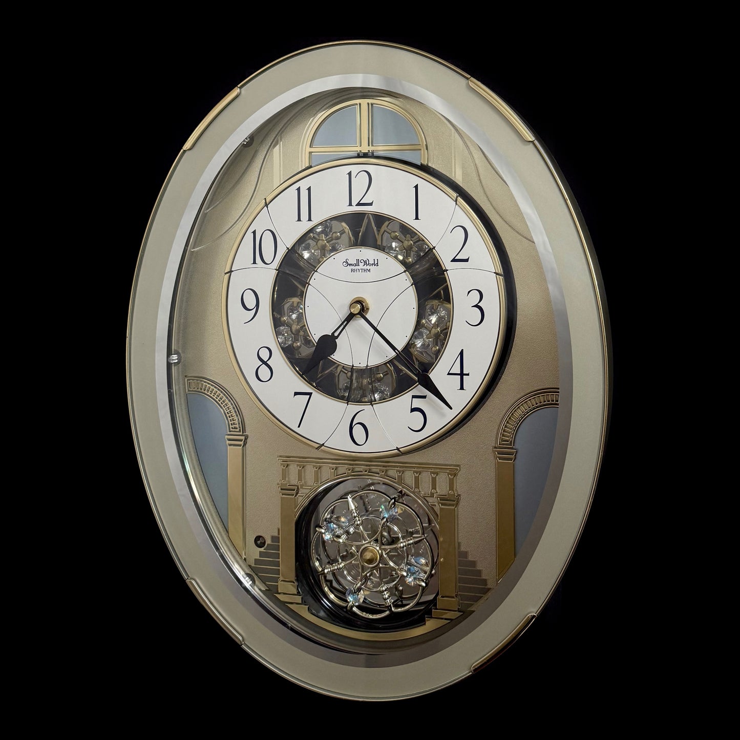 Rhythm "CTS Brilliance" Moving Dial Magic Motion Musical Wall Clock with Popular Melodies - 4MH787-R18