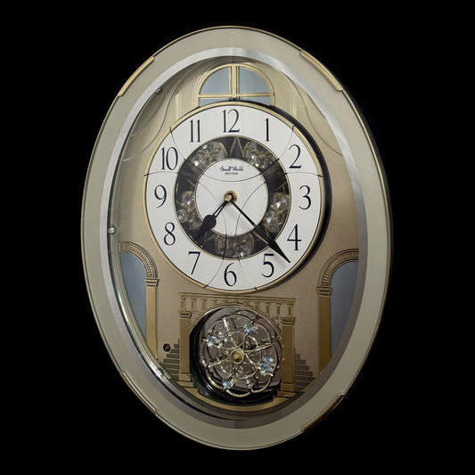 Rhythm "CTS Brilliance" Moving Dial Magic Motion Musical Wall Clock with Popular Melodies - 4MH787-R18