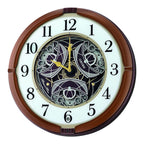 Seiko QXM380BRH “Mechanical” Melodies in Motion Dancing Dial Musical Wall Clock with 18 Songs