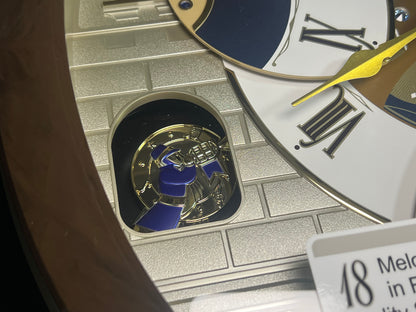 Seiko QXM371BRH “Castle Windows” Melodies in Motion Dancing Dial Musical Wall Clock