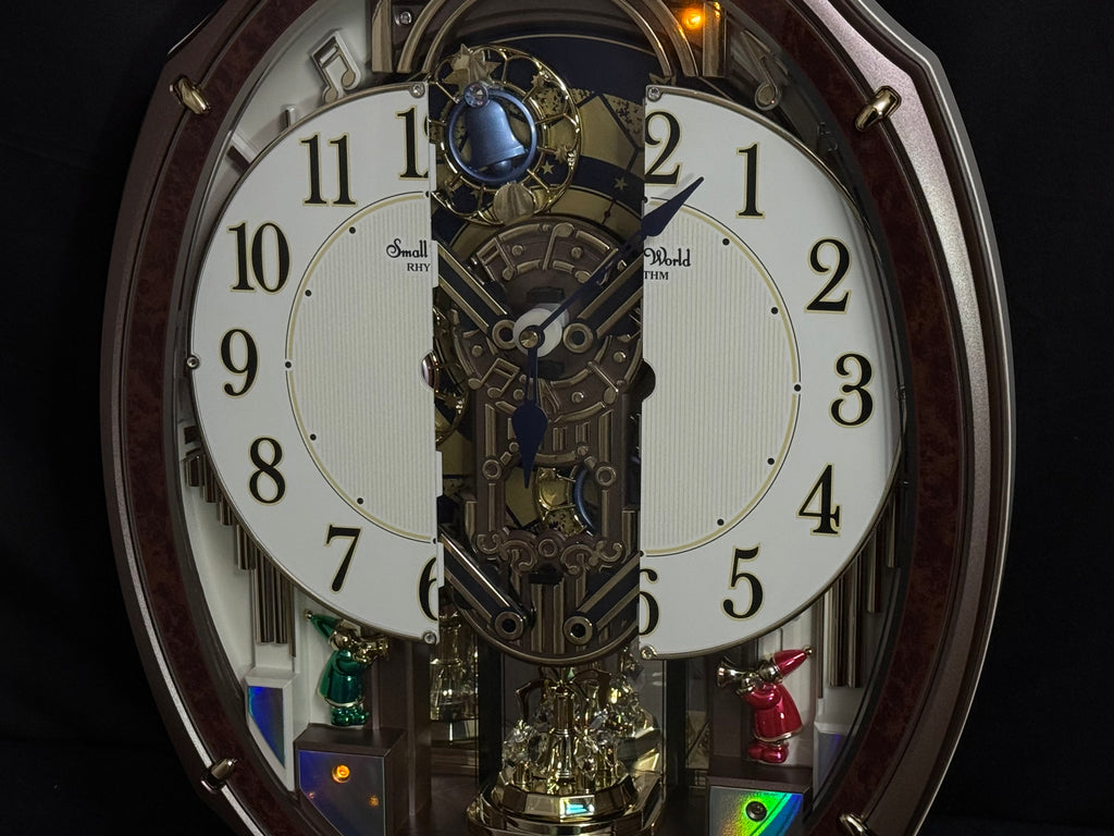 Rhythm "Harmony Blessing" Moving Dial Magic Motion Musical Wall Clock - 4MH423WR23