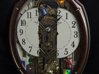 Rhythm "Harmony Blessing" Moving Dial Magic Motion Musical Wall Clock - 4MH423WR23