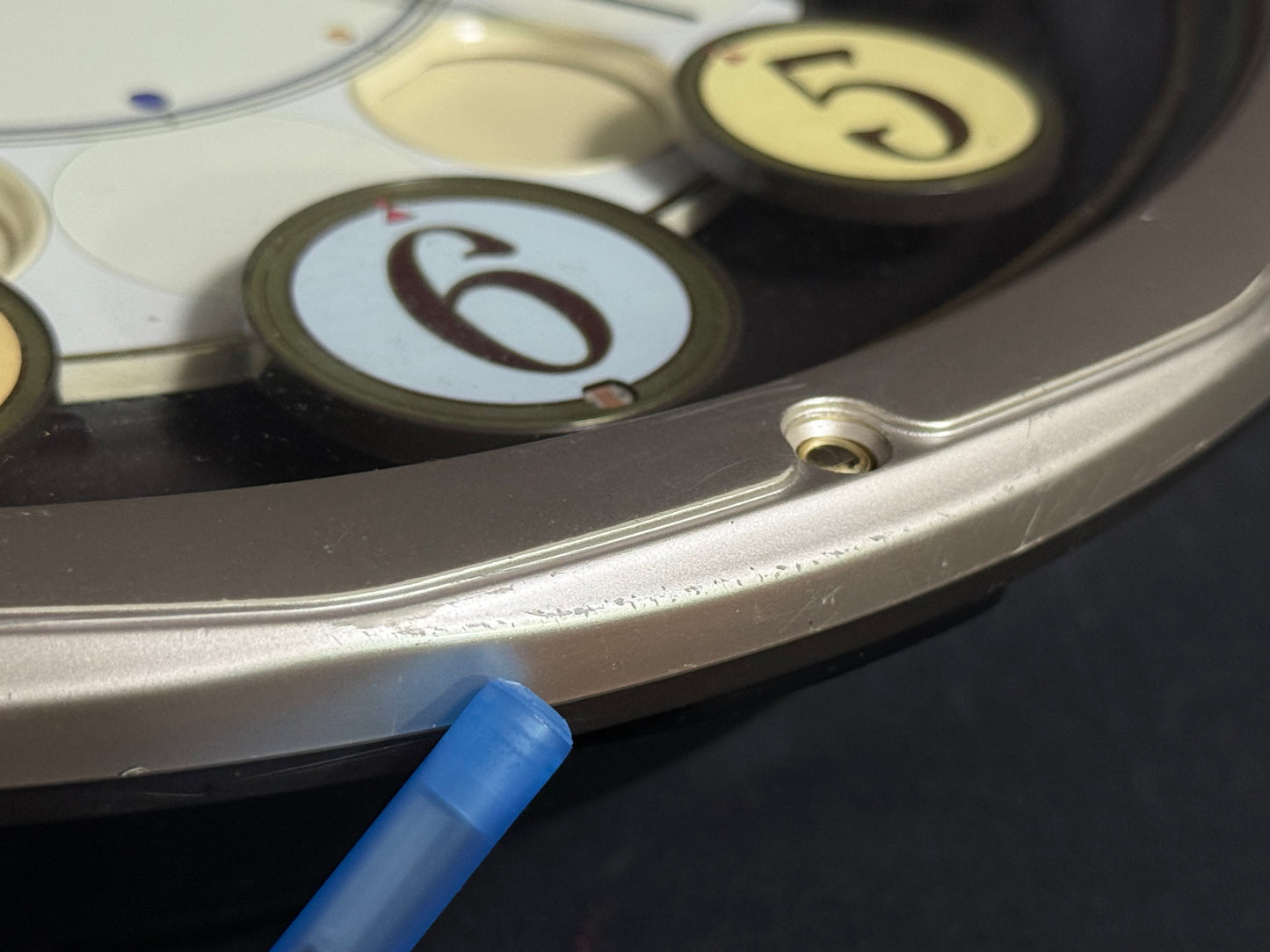 Seiko QXM106SRH "Twirling Numbers" Melodies in Motion Musical Wall Clock with Moving Dial