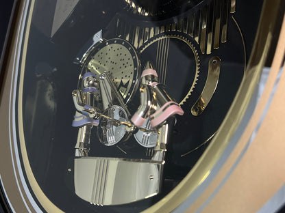 Seiko QXM124GRH "Music Disc Figurines" Melodies in Motion Musical Moving Wall Clock with Popular Music