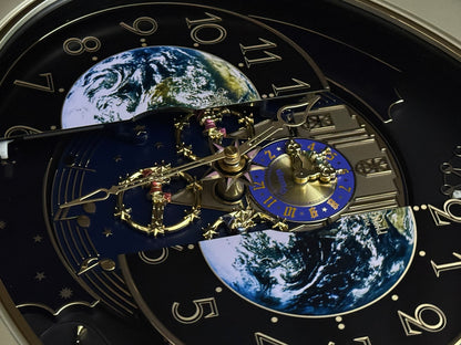 Rhythm “Peaceful Cosmos Entertainer” Moving Earth Dial Magic Motion Musical Wall Clock with Popular Melodies - 4MH839WB19