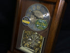 Rhythm “WSM Highland” Traditional Wooden Musical & Chiming Pendulum Mantel Clock with Embossed Steel Dial - CRH270UR06