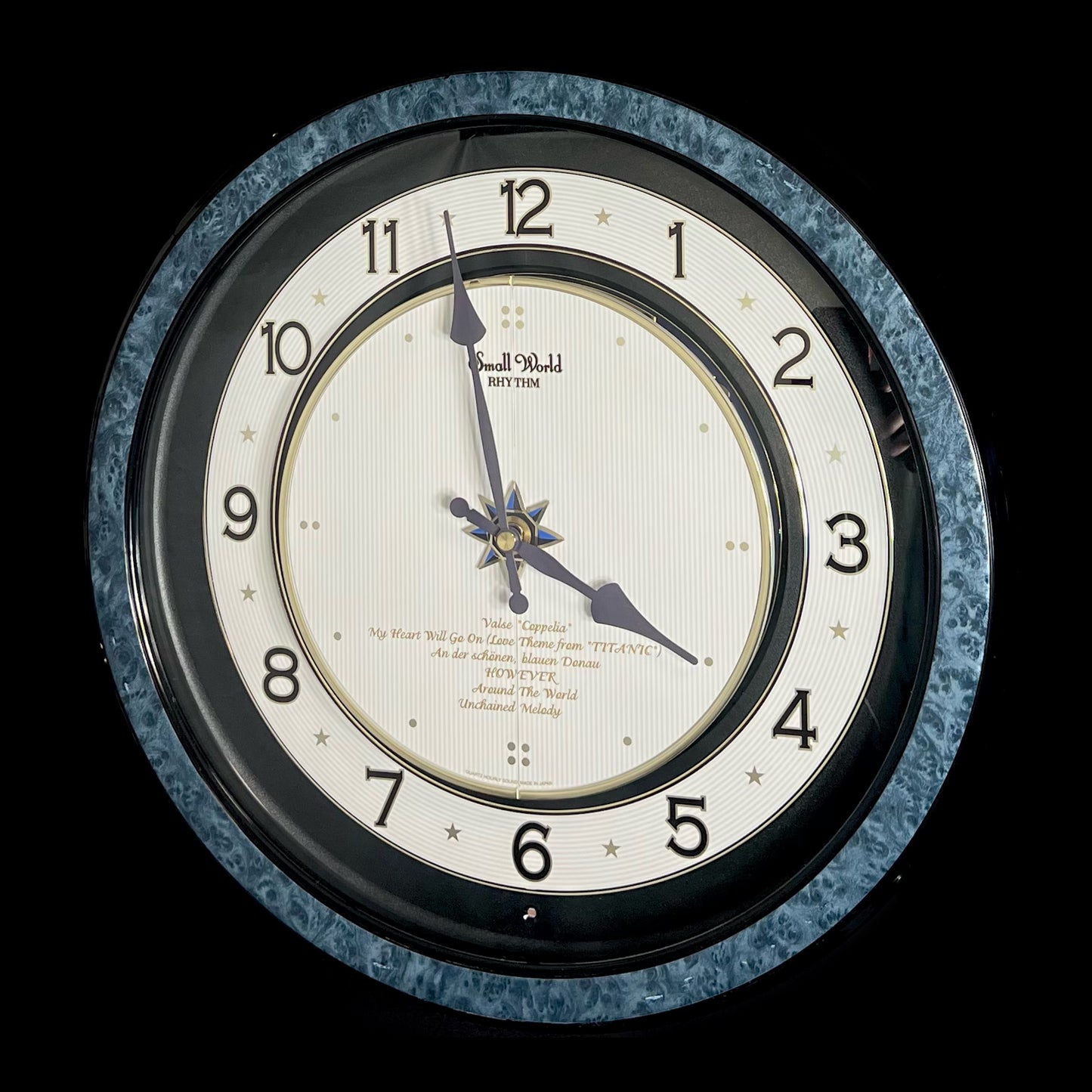 Rhythm “Small World Partage Home (Blue)” Moving Dial Magic Motion Musical Wall Clock with Popular Melodies - 4MH754RH04