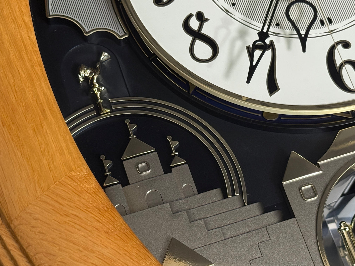 Rhythm "Timecracker Golden Oak" Moving Dial Magic Motion Musical Wooden Wall Clock with Popular Melodies - 4MH782-R07