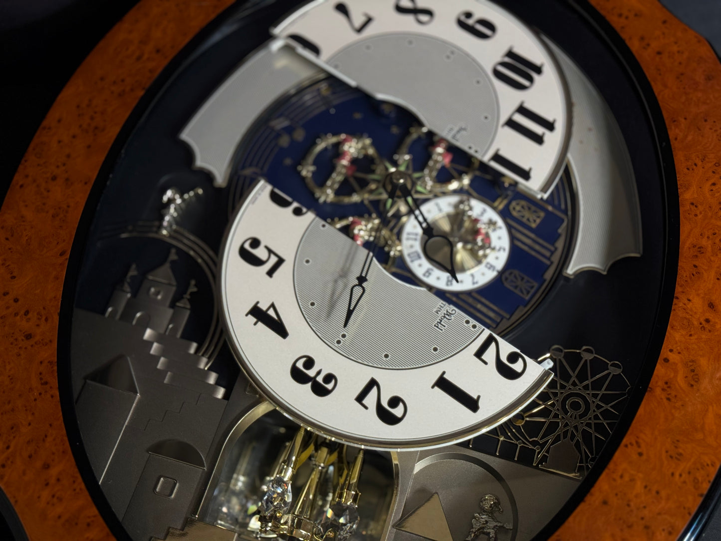 Rhythm “DWS Timecracker” Moving Dial Magic Motion Musical Wooden Wall Clock with Popular Melodies - 4MH752-R06