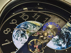 Rhythm “Peaceful Cosmos Entertainer” Moving Earth Dial Magic Motion Musical Wall Clock with Popular Melodies - 4MH839WB19