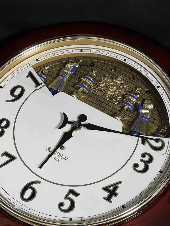 Rhythm “Cherry Wood Ring Bells” Magic Motion Musical Wall Clock with Surprise Dial Animation and Moving Figurines - 4MH652RH06