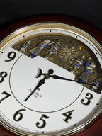 Rhythm “Small World Ceremony 3” Magic Motion Musical Wall Clock with Moving Figurines and Surprise Dial Animation - 4MH652RH06