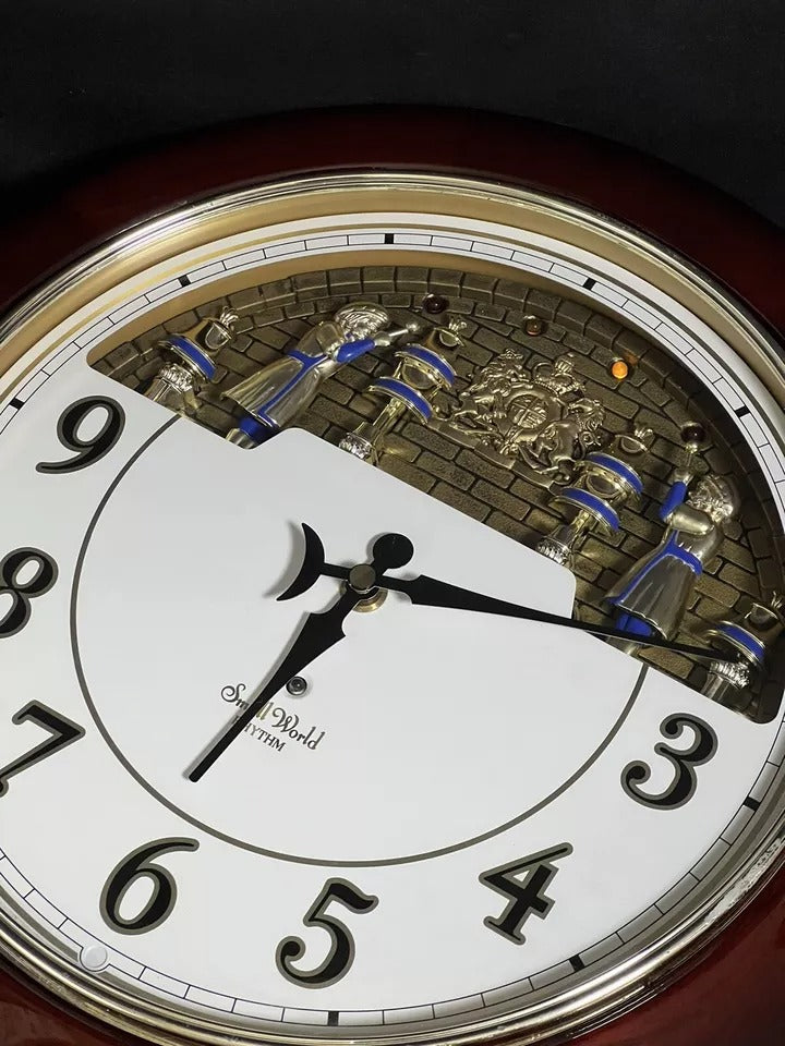 Rhythm “Cherry Wood Ring Bells” Magic Motion Musical Wall Clock with Surprise Dial Animation and Moving Figurines - 4MH652RH06