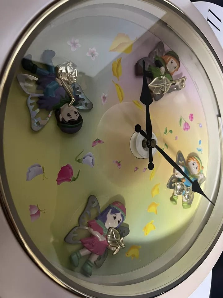 Rhythm “Floral Fantasy” Magic Motion Musical Wall Clock with Surprise Dial Animation and Moving Figurines - 4MH663-R34