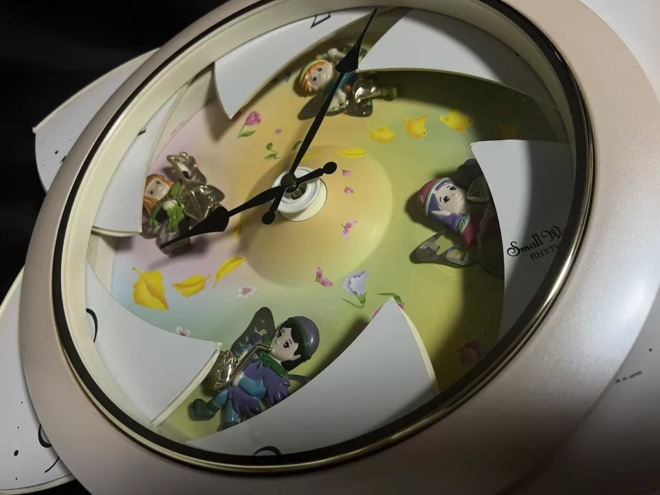 Rhythm “Floral Fantasy” Magic Motion Musical Wall Clock with Surprise Dial Animation and Moving Figurines - 4MH663-R34