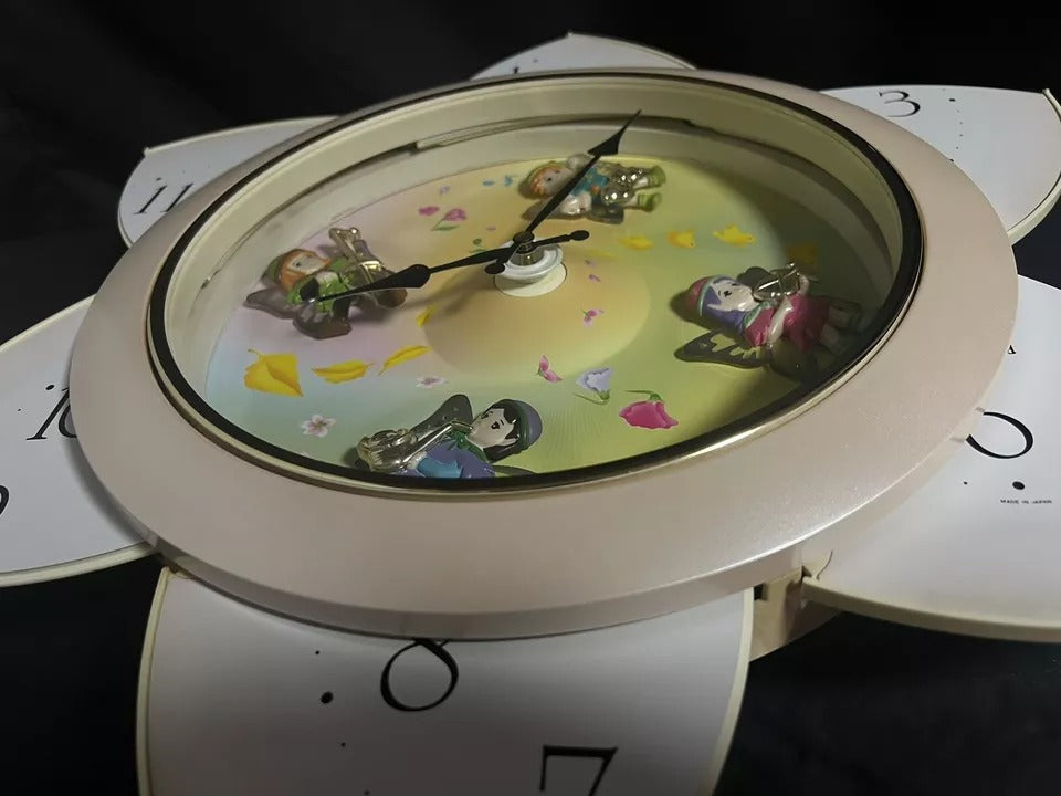 Rhythm “Floral Fantasy” Magic Motion Musical Wall Clock with Surprise Dial Animation and Moving Figurines - 4MH663-R34
