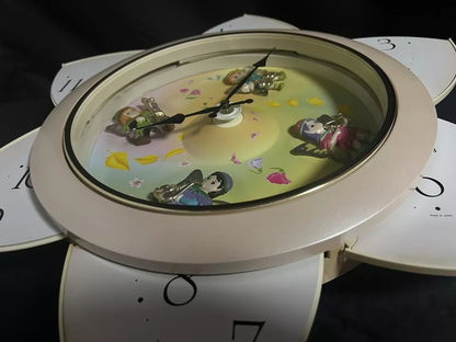 Rhythm “Floral Fantasy” Magic Motion Musical Wall Clock with Surprise Dial Animation and Moving Figurines - 4MH663-R34