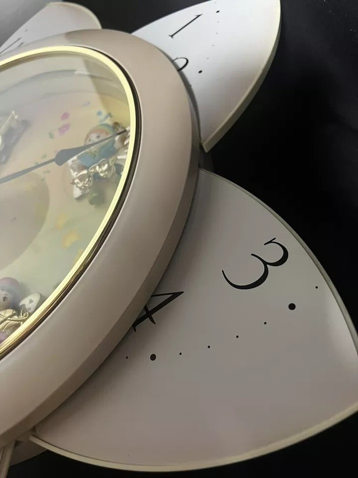 Rhythm “Floral Fantasy” Magic Motion Musical Wall Clock with Surprise Dial Animation and Moving Figurines - 4MH663-R34