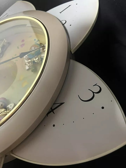 Rhythm “Floral Fantasy” Magic Motion Musical Wall Clock with Surprise Dial Animation and Moving Figurines - 4MH663-R34