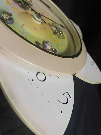 Rhythm “Floral Fantasy” Magic Motion Musical Wall Clock with Surprise Dial Animation and Moving Figurines - 4MH663-R34