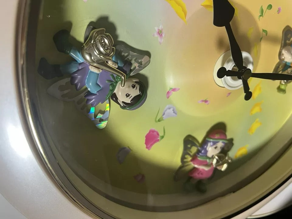 Rhythm “Floral Fantasy” Magic Motion Musical Wall Clock with Surprise Dial Animation and Moving Figurines - 4MH663-R34