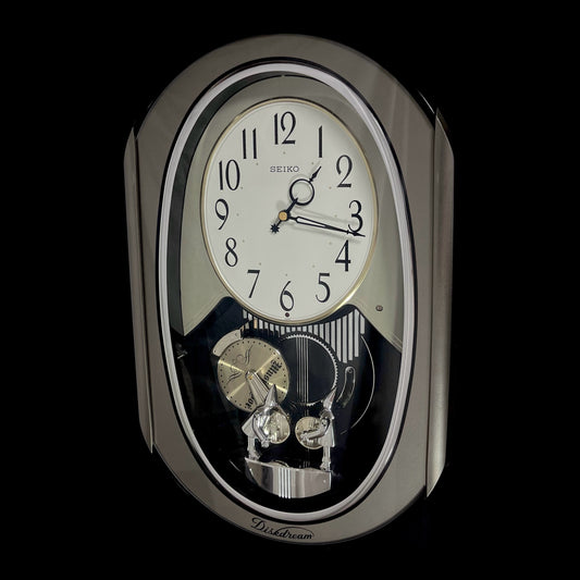 Seiko RE528S "Diskdream Music Box" Musical Motion Wall Clock from Japan with Moving Figurines