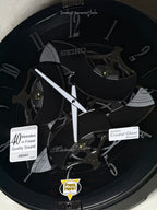 Seiko QXM621KRH “Onyx” Melodies in Motion Dancing Dial Musical Wall Clock with 40 Songs