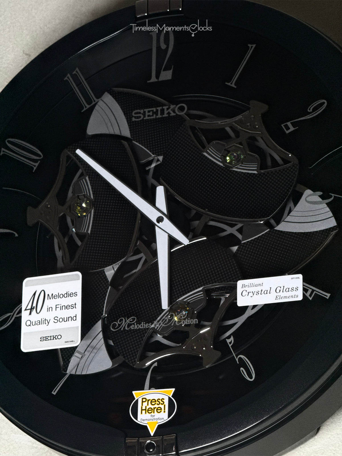 Seiko QXM621KRH “Onyx” Melodies in Motion Dancing Dial Musical Wall Clock with 40 Songs