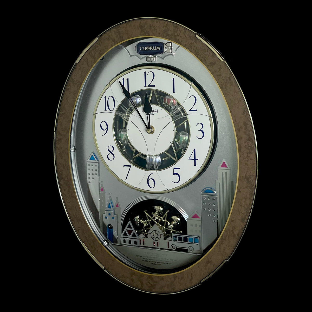 Rhythm “Tri-Cracker” Moving Dial Magic Motion Musical Wall Clock with Popular Melodies - 4MH759NR06