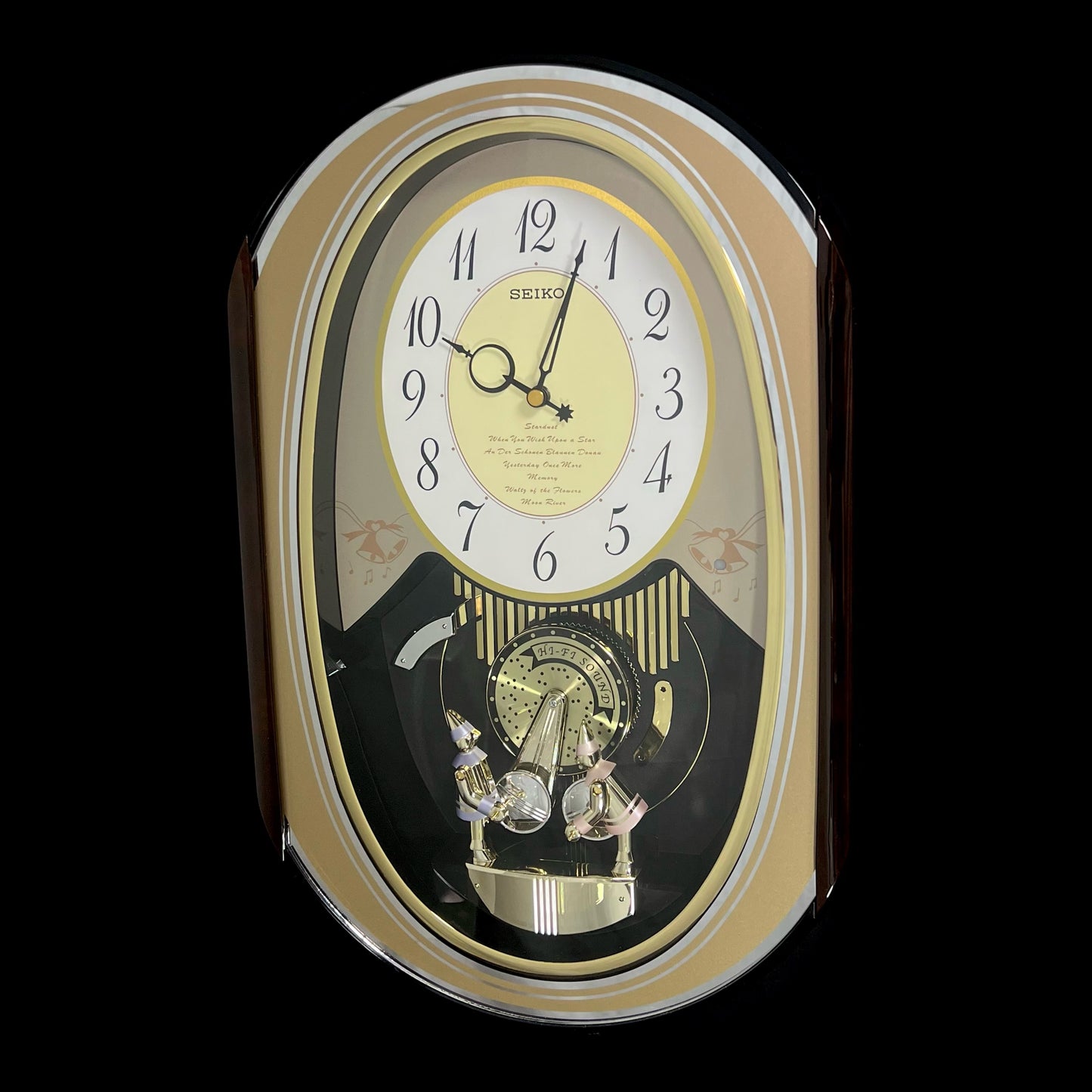 Seiko QXM124GRH "Music Disc Figurines" Melodies in Motion Musical Moving Wall Clock with Popular Music