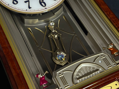 Seiko QXM223BRH "Classic Dropping Dial" Melodies in Motion Musical Moving Wall Clock