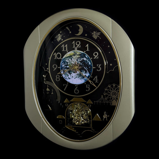Rhythm “Peaceful Cosmos Entertainer” Moving Earth Dial Magic Motion Musical Wall Clock with Popular Melodies - 4MH839WB19