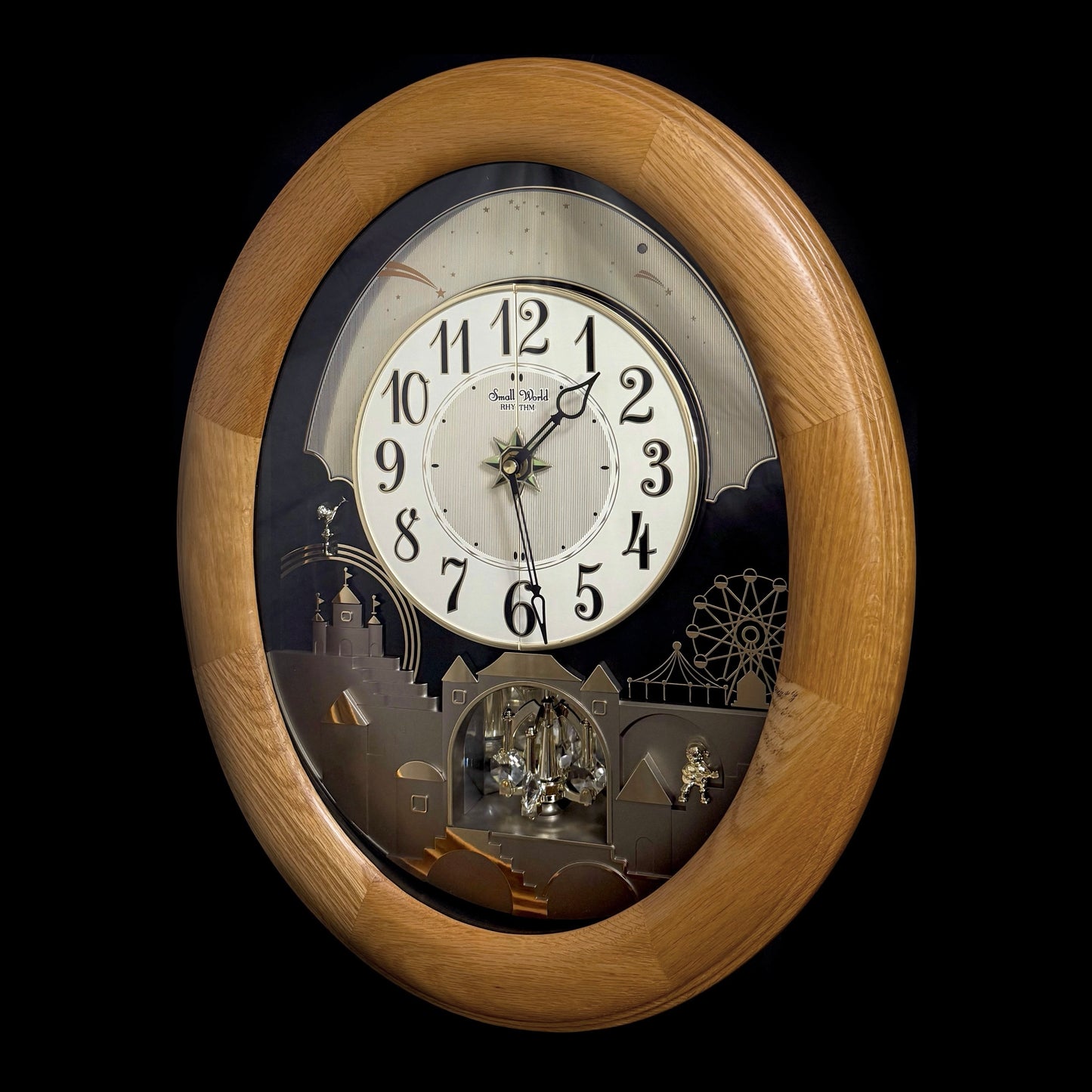 Rhythm "Timecracker Golden Oak" Moving Dial Magic Motion Musical Wooden Wall Clock with Popular Melodies - 4MH782-R07