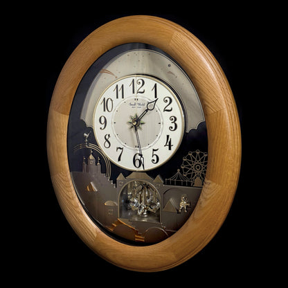 Rhythm "Timecracker Golden Oak" Moving Dial Magic Motion Musical Wooden Wall Clock with Popular Melodies - 4MH782-R07