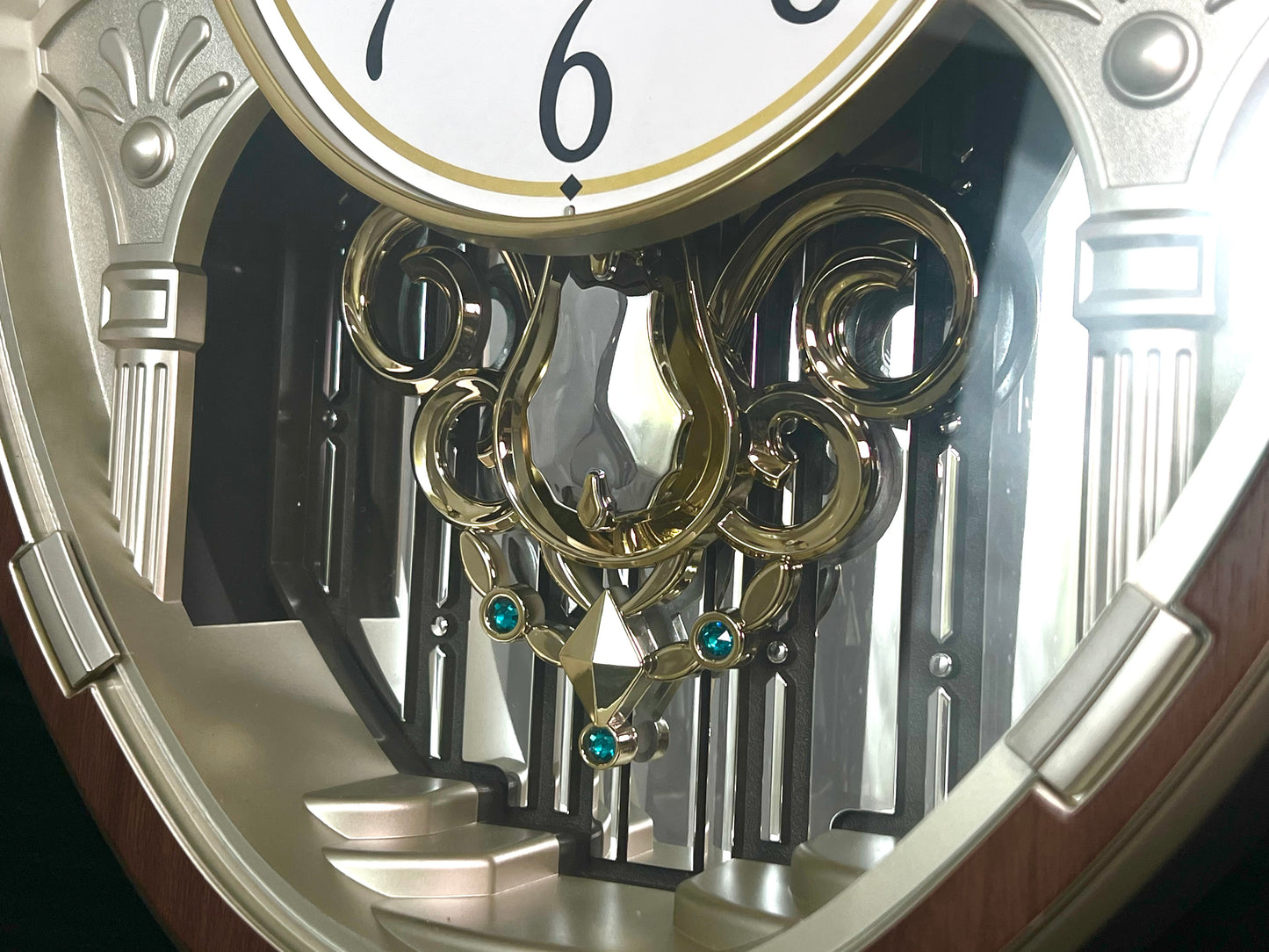Seiko QXM369BRH “Golden Citadel” Melodies in Motion Musical Decorative Pendulum Wall Clock