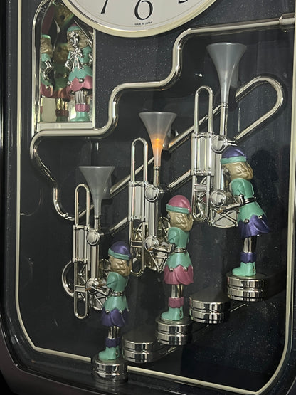 Rhythm "Trumpet Trio" Magic Motion Musical Wall Clock with Animated Figurines - 4MH712-R02