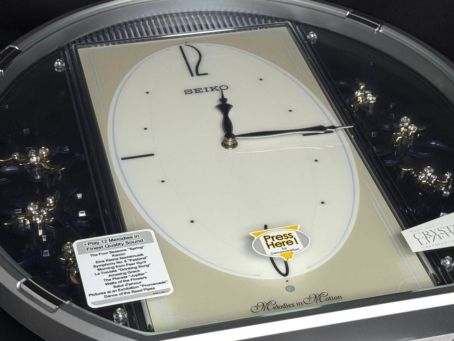Seiko QXM158SRH "Sparkling Crystals" Melodies in Motion Musical Decorative Pendulum Wall Clock
