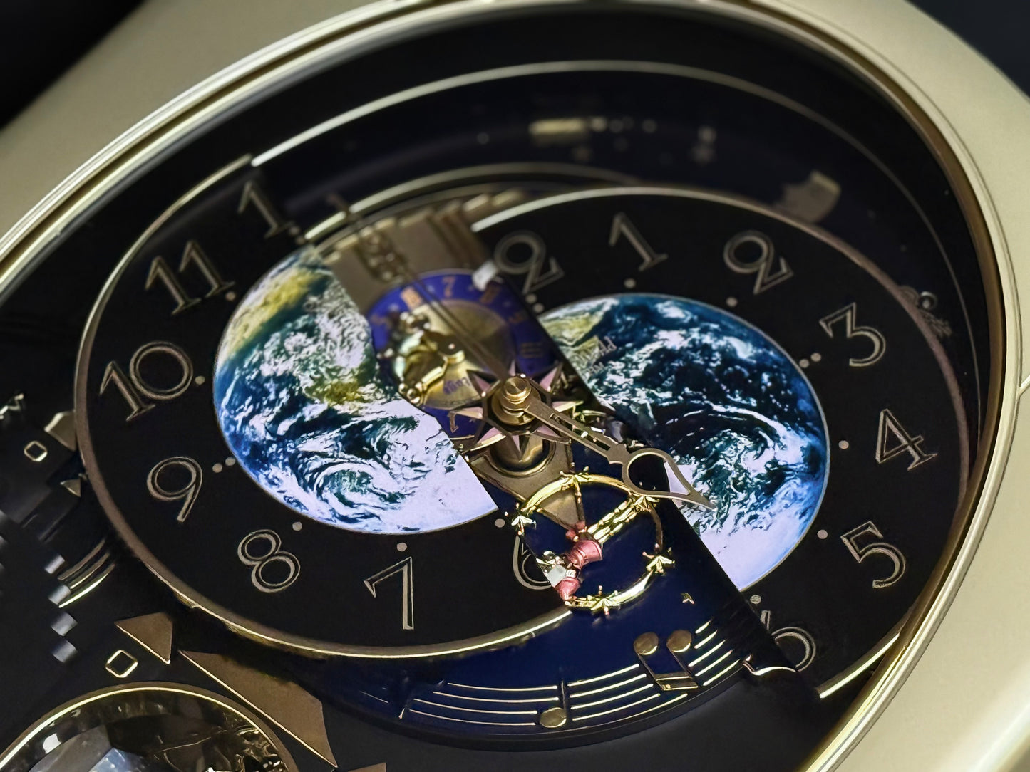 Rhythm “Peaceful Cosmos Entertainer” Moving Earth Dial Magic Motion Musical Wall Clock with Popular Melodies - 4MH839WB19