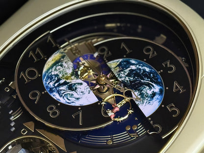 Rhythm “Peaceful Cosmos Entertainer” Moving Earth Dial Magic Motion Musical Wall Clock with Popular Melodies - 4MH839WB19