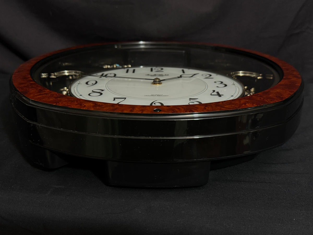 Rhythm "DWS Cinderella" Musical Motion Decorative Pendulum Wall Clock with Popular Melodies - 4MH762WR23